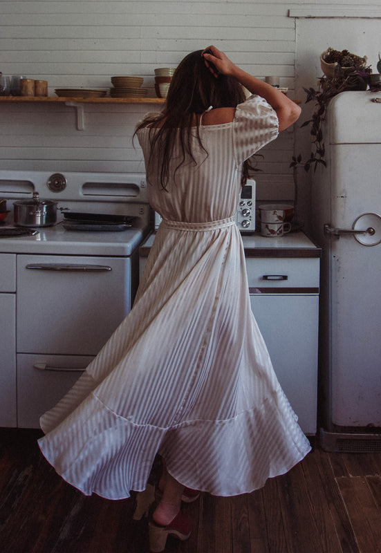 Christie Araujo Idylwild Vintage feminine Asymmetrical hem ruffle dress w off the shoulder puff sleeves