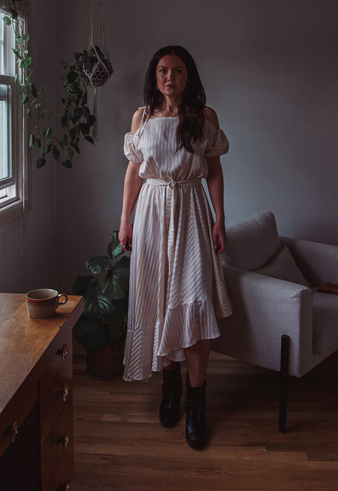 Idylwild Vintage feminine Asymmetrical hem ruffle dress w off the shoulder puff sleeves Christie Araujo