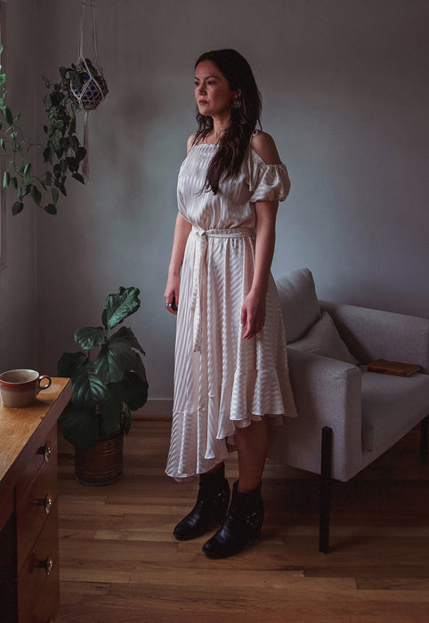 Idylwild Vintage feminine Asymmetrical hem ruffle dress w off the shoulder puff sleeves Christie Araujo