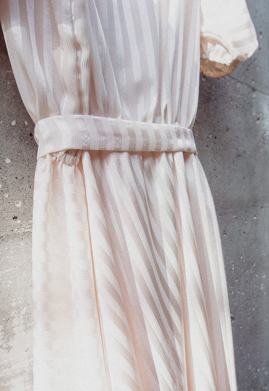 Idylwild Vintage feminine Asymmetrical hem ruffle dress w off the shoulder puff sleeves