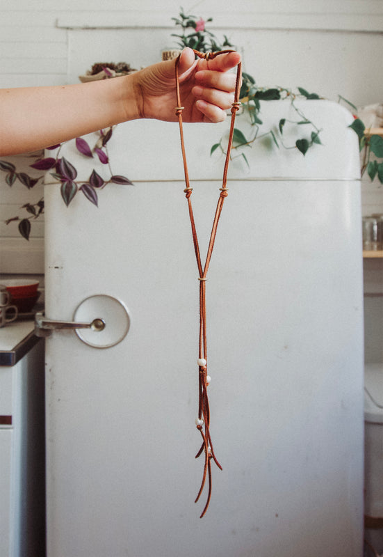 Christie Araujo Bridle Necklace Idylwild Jewelry Freshwater Pearls and Deerskin Leather Lacing